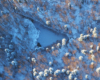 Dolne Jeziorko Duszatyńskie zimą sfotografowane podczas lotu paralotnią nad Bieszczadami przez Mariusza Janika z Biura Podróży Bieszczader.