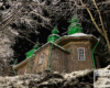 SZCZAWNE drewniana cerkiew sfotografowana nocą podczas wycieczki zimą po Bieszczadach.